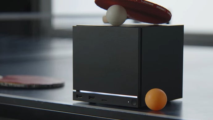 Consolă de gaming Steam Machine, design modern și compact, pentru experiență de gaming PC pe televizor.